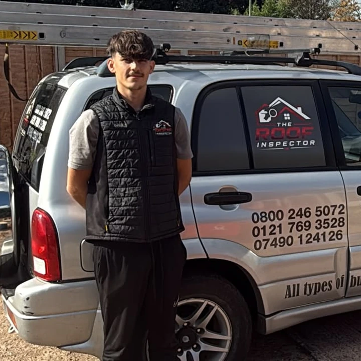 Jessie Clee, owner of The Roof Inspector, with the company vehicle